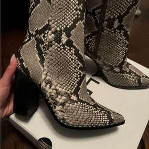 Aldo snake skin boots; women’s